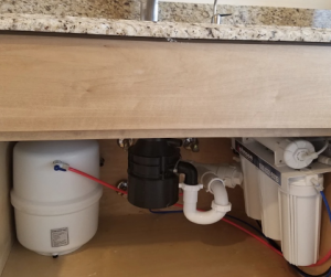 Reverse osmosis system installed under a sink in Oswego, Illinois