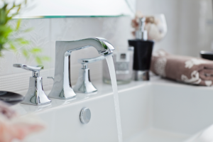 Conditioned water coming from a sink faucet at a house in Deer Park, Illinois