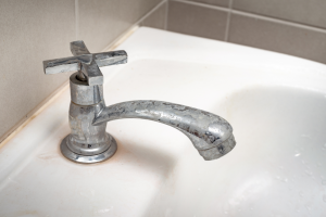 Limescale water stain on a faucet in Buffalo Grove, Illinois